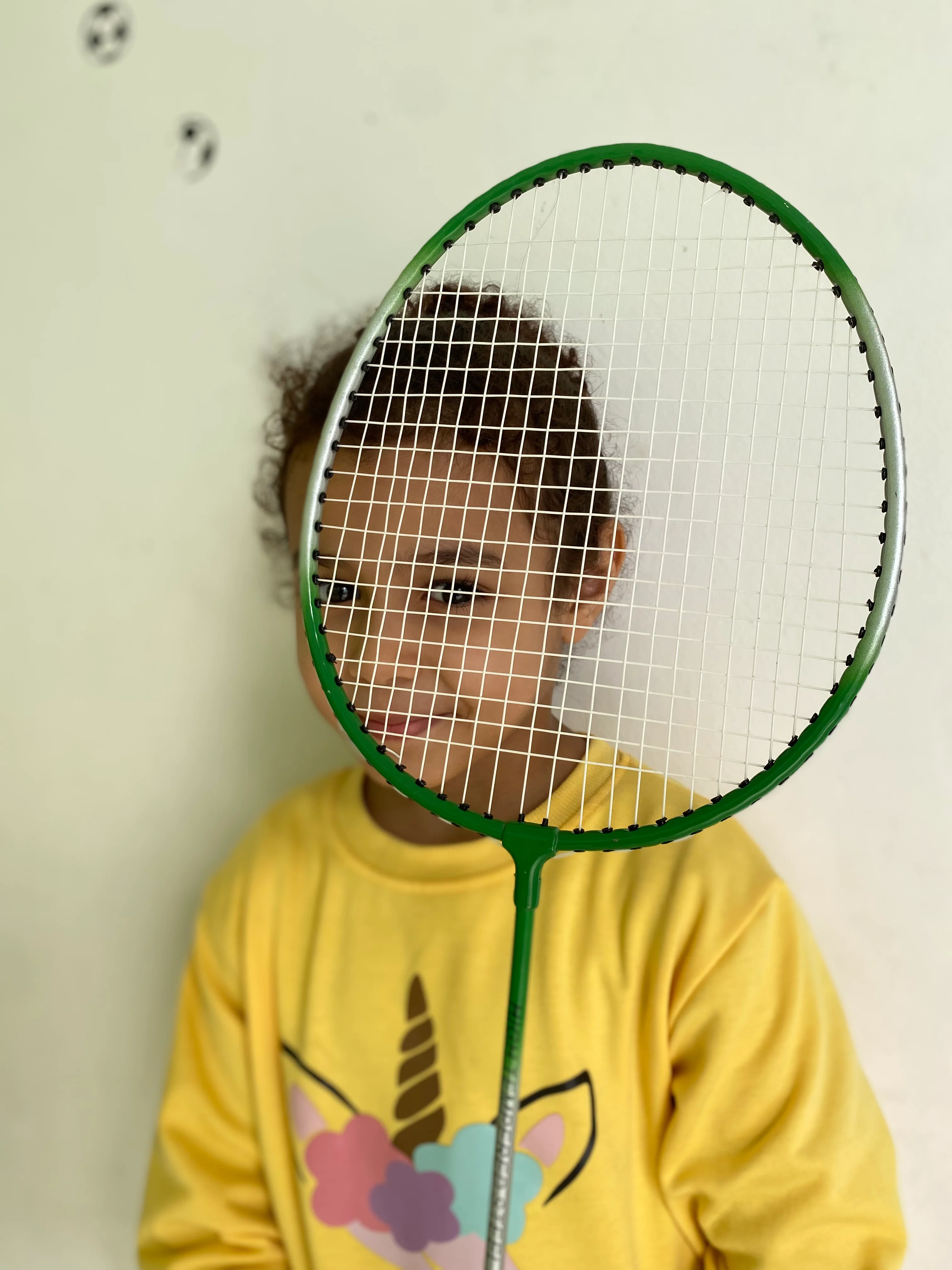 A young pupil enjoying a playful activity at school